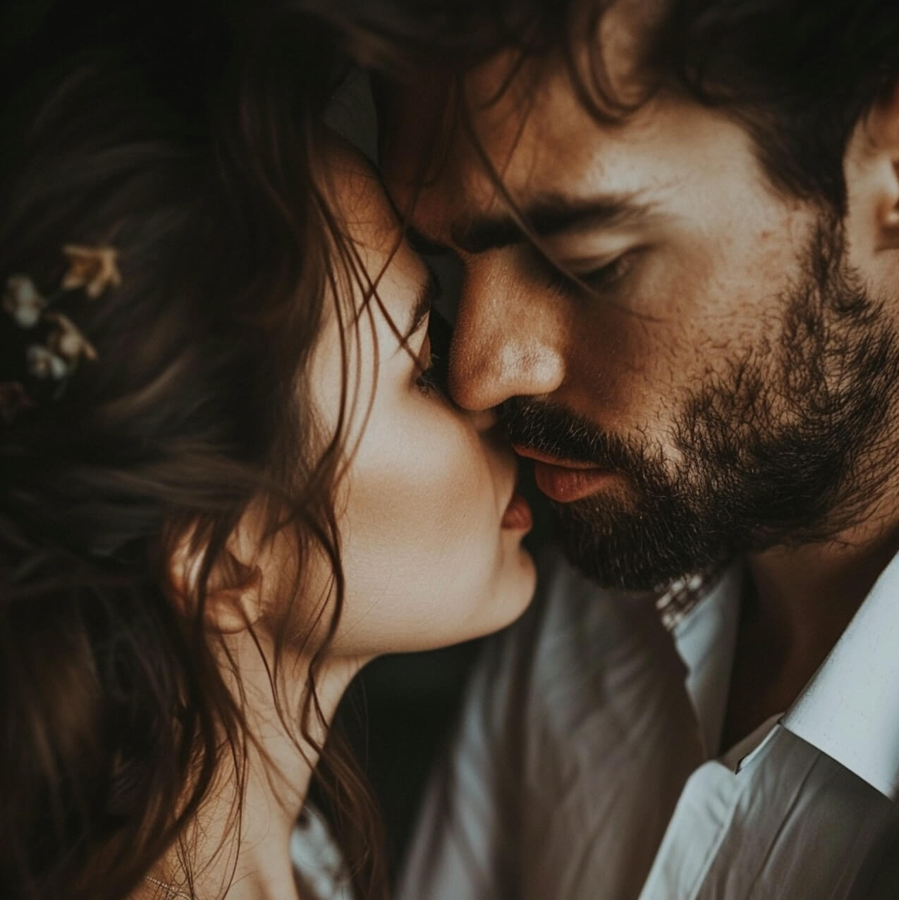 Couple kissing after using an interactive sex device.
