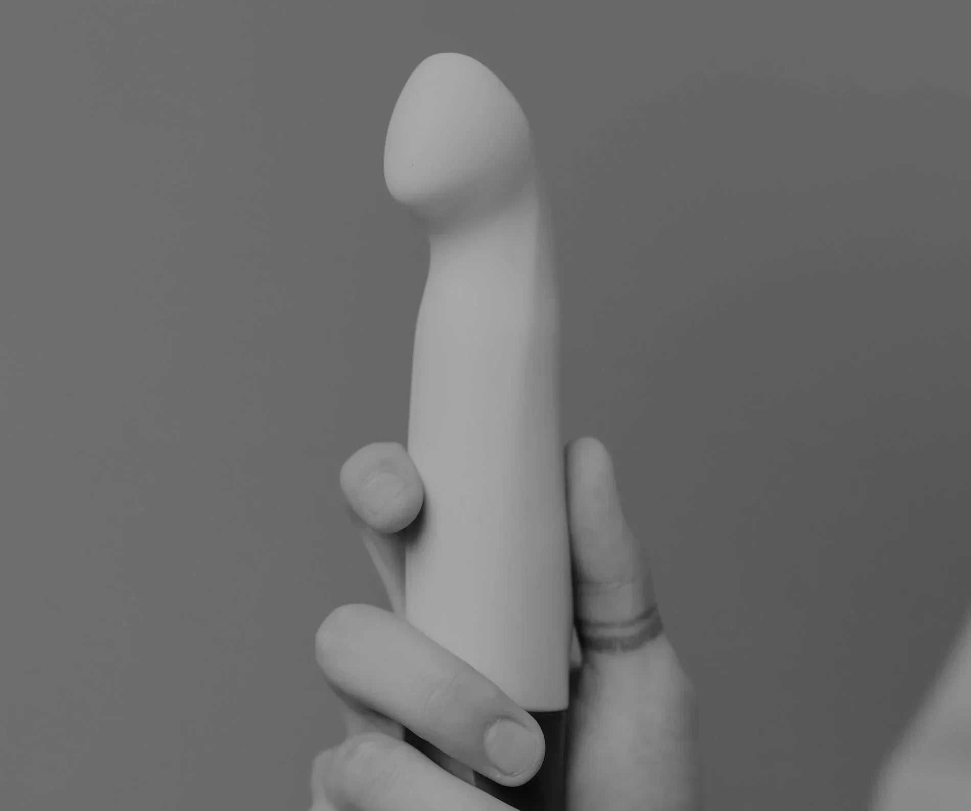 Women holding a soft silicone dildo from our dildos for women collection.
