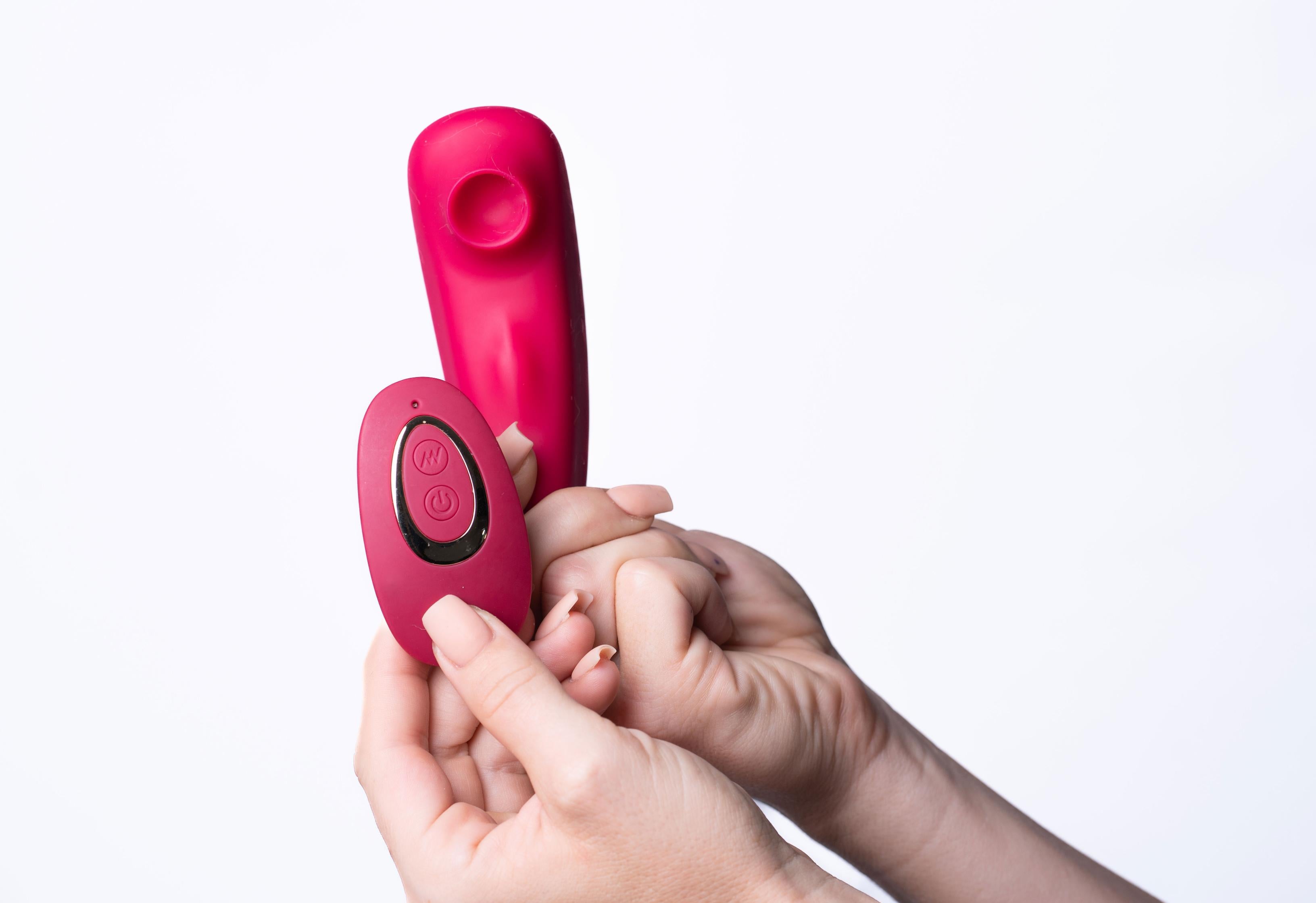 Remi 15-Function Rechargeable Remote Control Suction Panty Vibrator - Red