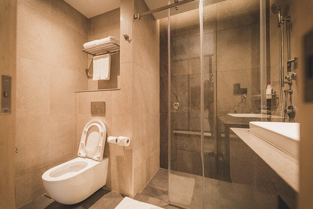 Modern restroom interior symbolizing sexual health, self-care, and the importance of urinating after dildo use for hygiene.