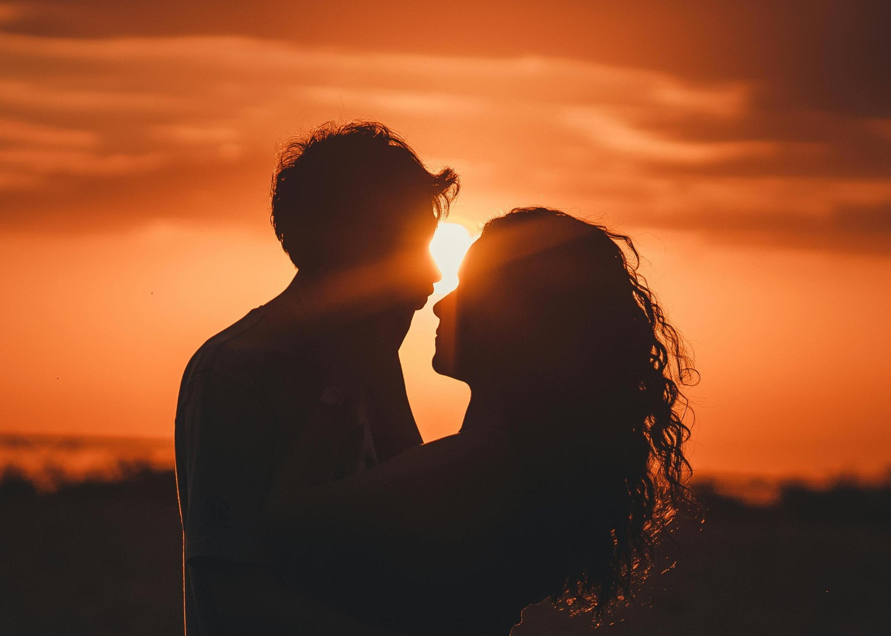 Couple Silhouette with Sunset in the Background